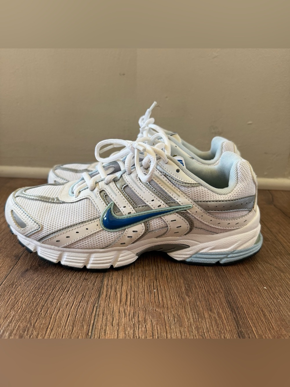Nike Air Skyraider White Athletic Dad Y2K Sneakers with Blue Swoosh Accent